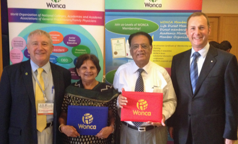 Garth Manning with Jyoti and Ramnik Parekh (as they sign up for life membership) and Michael Kidd