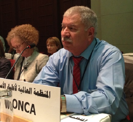 Mohamed Tarawneh (Jordan): then WONCA EMR president -serious at a WHO regional meeting 2013