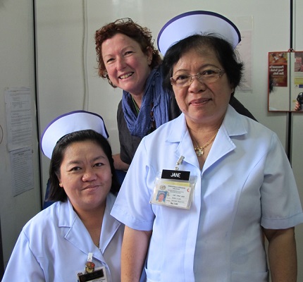 The WONCA Editor hiding behind practice nurses near Kuching, Malaysia 2014