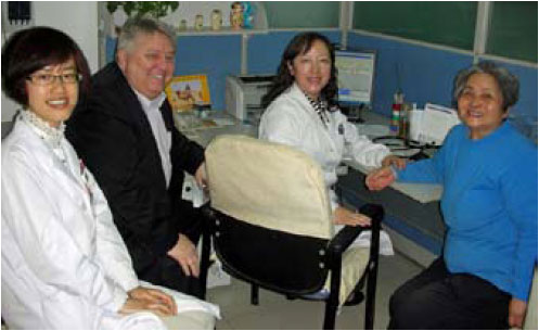 CHINA - Prof Rich Roberts sits in on a consultation with (from l to r): Dr Li Xiao Xiao, Dr Wu Lin, and patient Lu Ming. (June 2012 news)