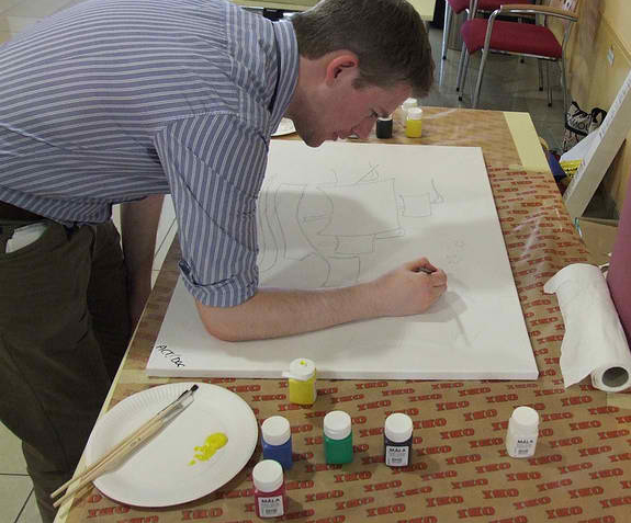 Greg Irving (VdGM Research Liaison Person) begins the painting
